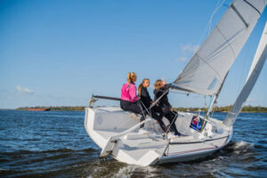 A dinghy with 3 women sailing. Good sailboat in North America