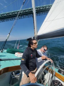 Blind veteran at the helm of the 12M JI sailboat Intrepid