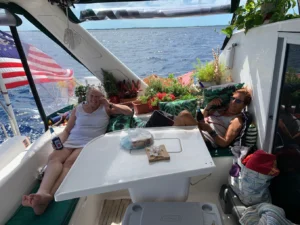 two women relaxing on a catamaran