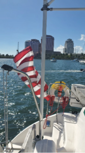 US flag when leaving Palm Beach, FL on board of catamaran Mojo