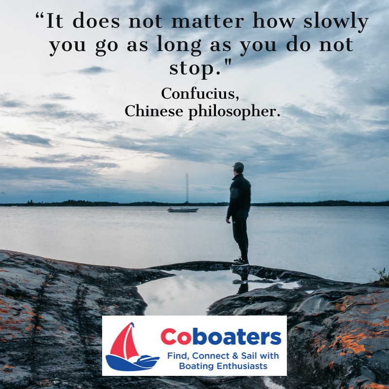 Sailing quote from Confucius. A man standing in in front of a sailboat.