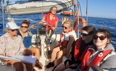 Female sailors on board a sailboat